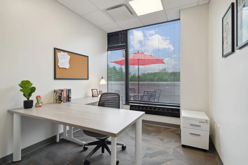 Furnished private office with a window view at 100 Matawan Rd